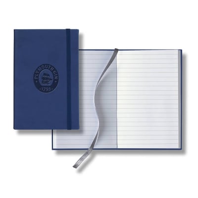 Blue Pocket Journal with logo on cover near open journal with marker ribbon