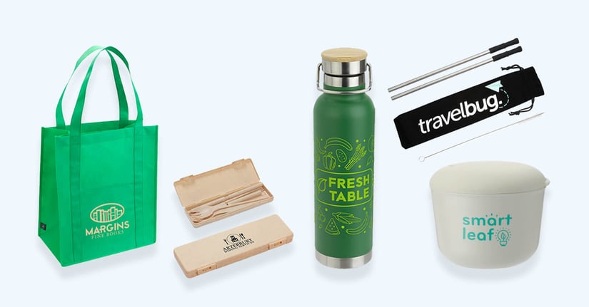 Collection of eco-friendly company swag including a branded water bottle and utensils made from recycled materials
