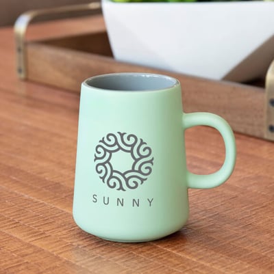 mint colored 15-oz mug with Sunny Logo